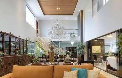 Imagem: A casa em condomínio possui 4 Dormitórios, 5 Banheiros, 4