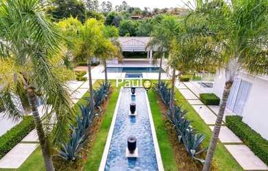 Imagem: A casa em condomínio possui 5 Dormitórios, 5 Banheiros, 5