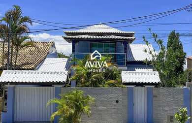 Imagem: A casa possui 3 Dormitórios, 3 Banheiros, 4 Vagas na garagem