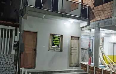 Imagem: A casa possui 2 Dormitórios, Acomodam 15 pessoas e 1 Vaga na