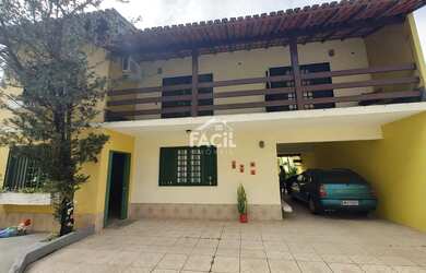 Imagem: A casa possui 5 Dormitórios, 4 Banheiros, 3 Vagas na garagem