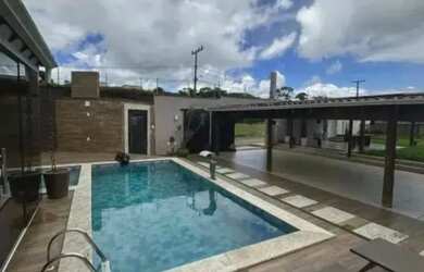 Imagem: A casa possui 5 Dormitórios, 5 Banheiros, 5 Vagas na garagem