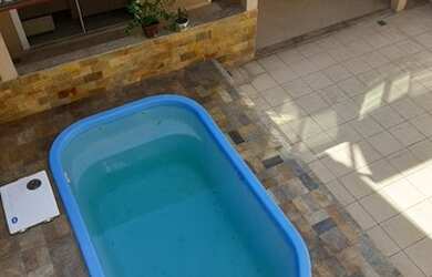 Imagem: A casa possui 4 Dormitórios, 4 Banheiros, 3 Vagas na garagem