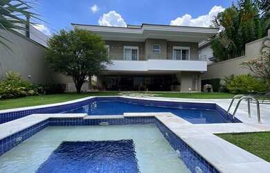 Imagem: A casa em condomínio possui 5 Dormitórios, 5 Banheiros, 5