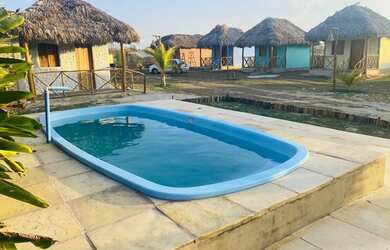 Imagem: A casa possui 1 Dormitório e 3 Vagas na garagem e está localizado