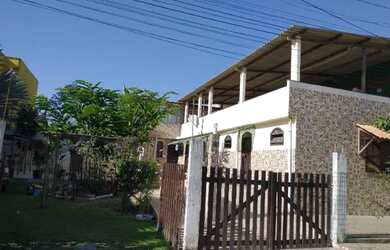 Imagem: A casa possui 1 Dormitório e 1 Vaga na garagem e está localizado