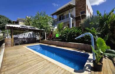 Imagem: A casa possui 3 Dormitórios, 3 Banheiros, 2 Vagas na garagem