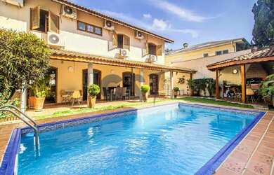 Imagem: A casa em condomínio possui 3 Dormitórios, 4 Banheiros, 5