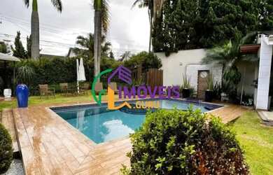 Imagem: A casa em condomínio possui 4 Dormitórios, 5 Banheiros, 4