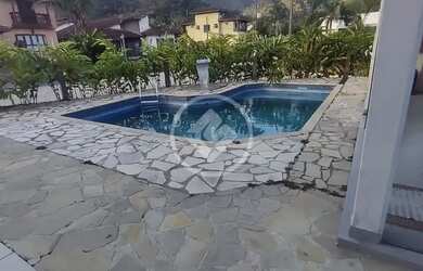 Imagem: A casa em condomínio possui 3 Dormitórios, 3 Banheiros, 4