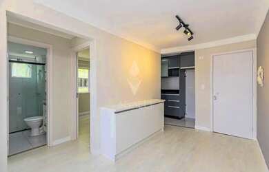 Imagem: O apartamento possui 2 Dormitórios, 1 Banheiro, 1 Vaga na garagem