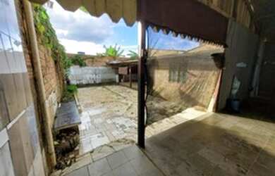 Imagem: A casa possui 2 Dormitórios, 2 Vagas na garagem e está localizado