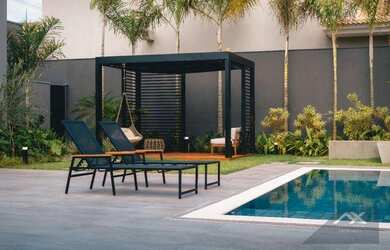 Imagem: A casa em condomínio possui 4 Dormitórios, 5 Banheiros, 4