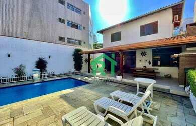 Imagem: A casa possui 5 Dormitórios, 4 Banheiros, 5 Vagas na garagem