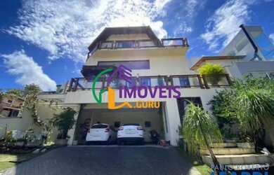 Imagem: A casa em condomínio possui 4 Dormitórios, 5 Banheiros, 2