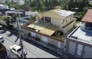 Imagem: A casa possui 3 Dormitórios, 2 Banheiros, 5 Vagas na garagem