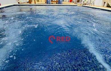 Imagem: A casa em condomínio possui 5 Dormitórios, 5 Banheiros, 5