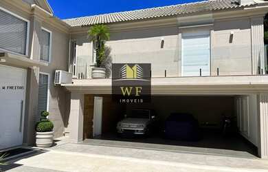 Imagem: A casa em condomínio possui 5 Dormitórios, 5 Banheiros, 5