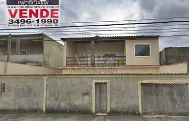 Imagem: A casa possui 4 Dormitórios, 3 Banheiros, 2 Vagas na garagem