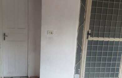 Imagem: A casa possui 2 Dormitórios, 2 Banheiros, 4 Vagas na garagem