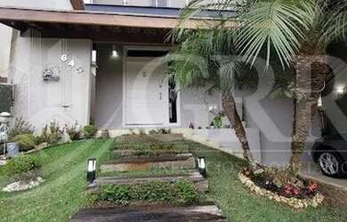 Imagem: A casa em condomínio possui 3 Dormitórios, 4 Banheiros, 2