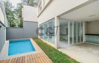 Imagem: A casa em condomínio possui 4 Dormitórios, 5 Banheiros, 4