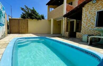 Imagem: A casa possui 5 Dormitórios, 5 Banheiros, 3 Vagas na garagem