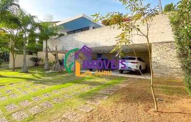 Imagem: A casa em condomínio possui 4 Dormitórios, 5 Banheiros, 4