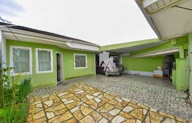 Imagem: A casa possui 2 Dormitórios, 2 Banheiros, 2 Vagas na garagem