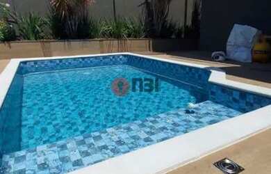 Imagem: A casa em condomínio possui 3 Dormitórios, 5 Banheiros, 4