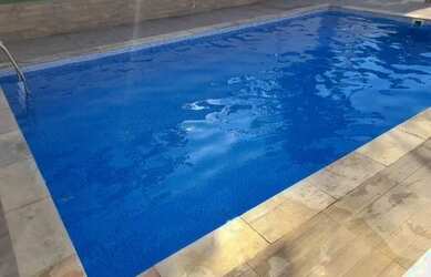 Imagem: A casa possui 3 Dormitórios, 3 Banheiros, 3 Vagas na garagem