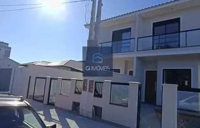 Imagem: A casa possui 3 Dormitórios, 3 Banheiros, 1 Vaga na garagem