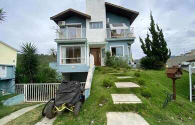 Imagem: A casa em condomínio possui 4 Dormitórios, 4 Banheiros, 2
