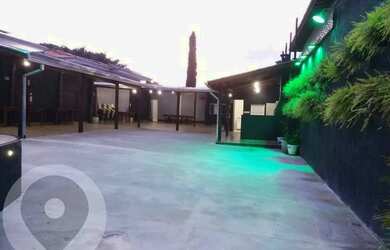 Imagem: A casa possui 2 Dormitórios, 3 Banheiros, 5 Vagas na garagem