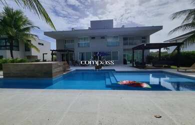 Imagem: A casa possui 5 Dormitórios, 5 Banheiros, 5 Vagas na garagem