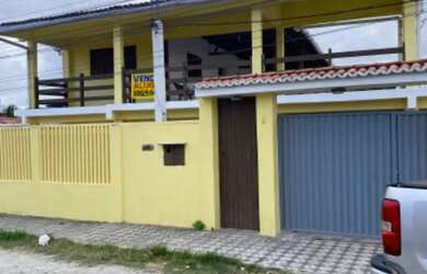 Imagem: A casa possui 5 Dormitórios, 5 Banheiros, 4 Vagas na garagem