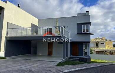 Imagem: A casa em condomínio possui 3 Dormitórios, 4 Banheiros, 3