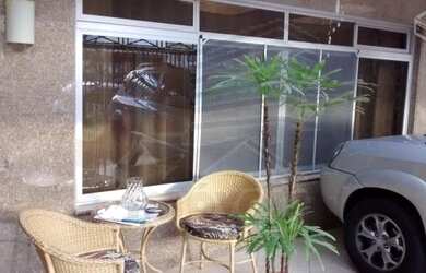 Imagem: A casa possui 2 Dormitórios, 2 Banheiros, 3 Vagas na garagem