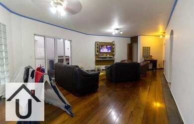 Imagem: A casa possui 3 Dormitórios, 5 Banheiros, 2 Vagas na garagem