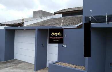 Imagem: A casa possui 2 Dormitórios, 2 Banheiros, 2 Vagas na garagem