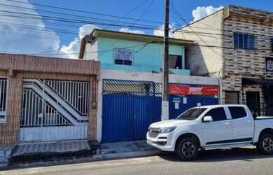Imagem: A casa possui 2 Dormitórios, 2 Banheiros, 1 Vaga na garagem
