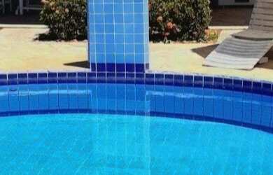 Imagem: A casa possui 4 Dormitórios, 5 Vagas na garagem e está localizado