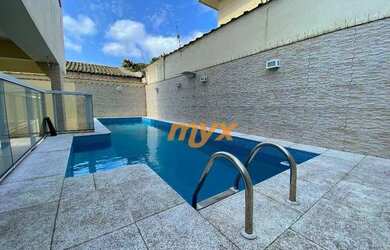 Imagem: A casa possui 3 Dormitórios, 4 Banheiros, 4 Vagas na garagem