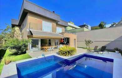 Imagem: A casa em condomínio possui 4 Dormitórios, 5 Banheiros, 4