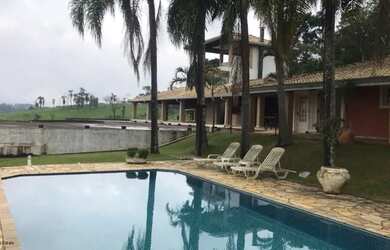 Imagem: A casa possui 5 Dormitórios, 5 Banheiros, 5 Vagas na garagem