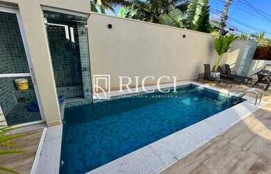 Imagem: A casa em condomínio possui 5 Dormitórios, 5 Banheiros, 5