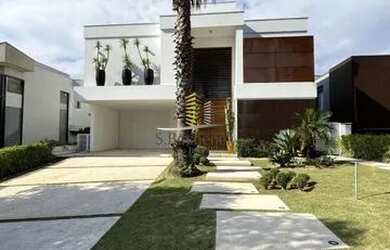 Imagem: A casa em condomínio possui 5 Dormitórios, 5 Banheiros, 4