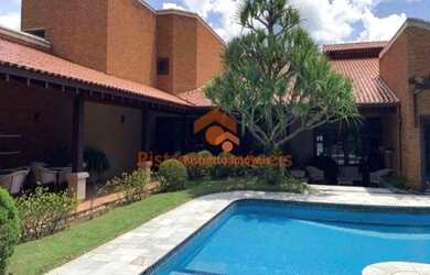 Imagem: A casa em condomínio possui 4 Dormitórios, 5 Banheiros, 3