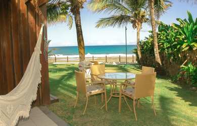 Imagem: A casa possui 2 Dormitórios, Acomodam 7 pessoas, 5 Vagas na