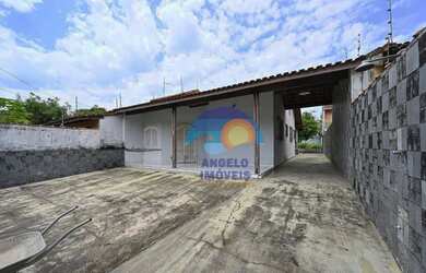 Imagem: A casa possui 2 Dormitórios, 2 Banheiros, 3 Vagas na garagem